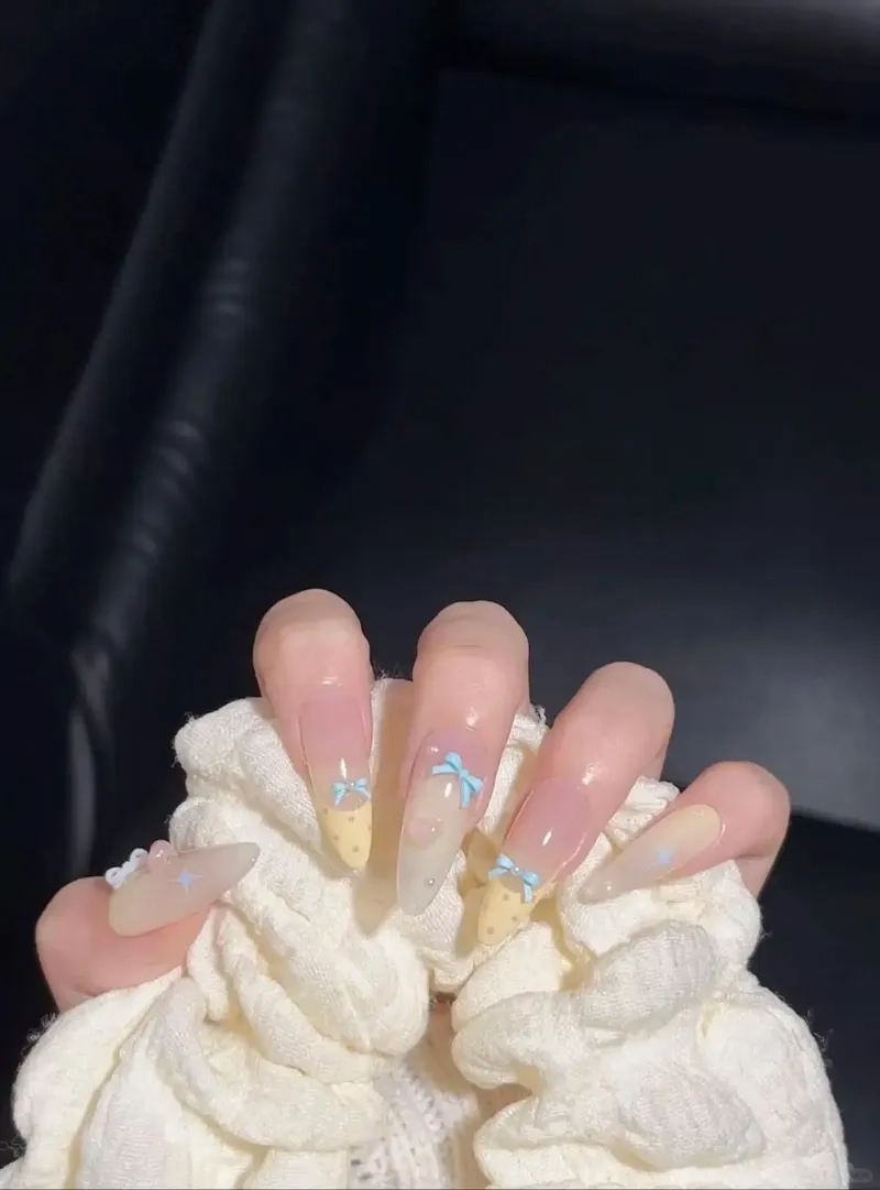 Tinh tế từng chi tiết nhờ gắn nơ nail nhẹ nhàng