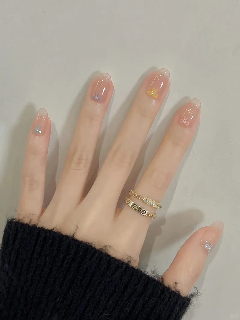 Tinh tế và dịu dàng với mẫu nail gắn nơ dễ thương