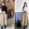Cách Phối Đồ Với Chân Váy Xòe Đen Dài Sang Trọng