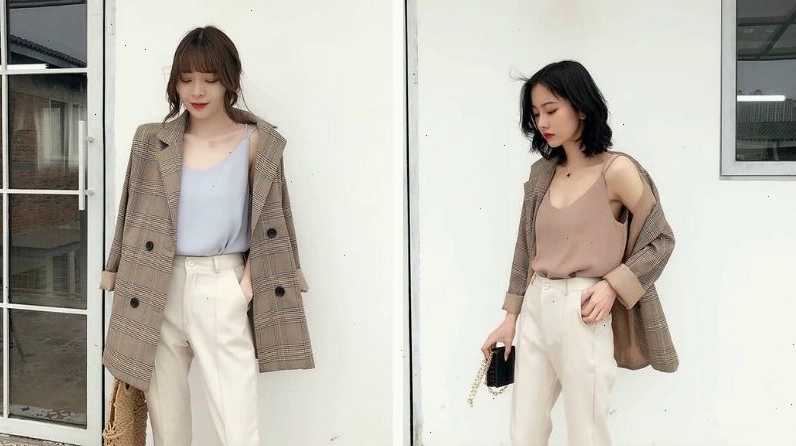 Áo blazer khoác ngoài áo hai dây mỏng màu đen gợi cảm