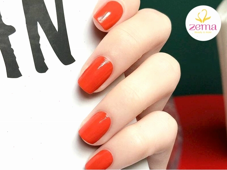 Nâng tone da tay với nail màu đỏ cam quốc dân luôn chiều lòng chị em